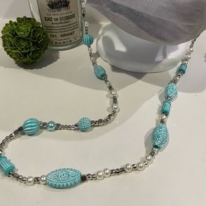 Teal and silver lanyard mask